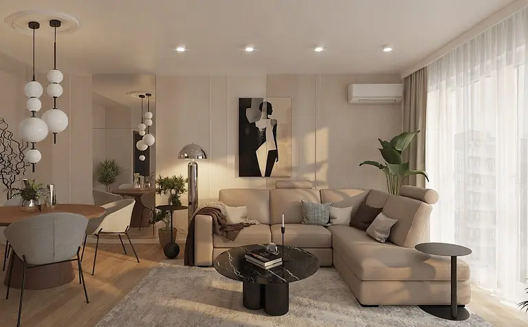 Wnętrze salonu z jasnymi meblami, nowoczesnymi lampami i roślinami.