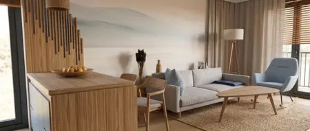 Wnętrze salonu w stylu skandynawskim z jasnymi meblami i drewnianymi detalami.