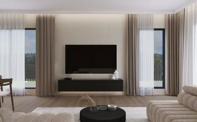 Nowoczesny salon o soft minimalizmie z beżowymi meblami i czarnym telewizorem.