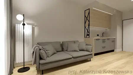 Wnętrze z szarym sofą, drewnianą kuchnią i lampą w stylu industrialnym, minimalistycznym i współczesnym.