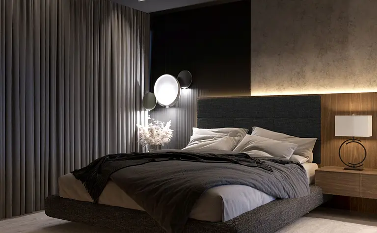 Sypialnia w stylu quiet luxury i współczesnym z szarym łóżkiem i dekoracyjnymi zasłonami.