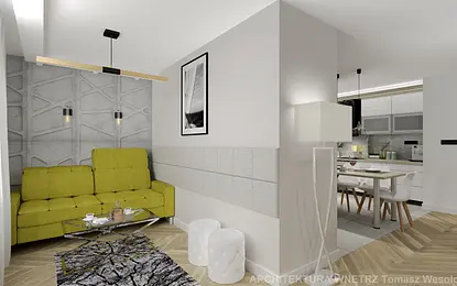 Wnętrze nowoczesnego salonu z zieloną kanapą i betonową ścianą