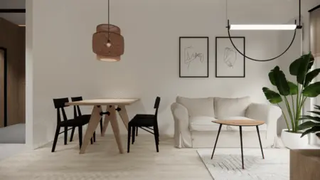 Wnętrze jadalni w stylu minimalistycznym z drewnianym stołem, czarnymi krzesłami oraz rośliną.