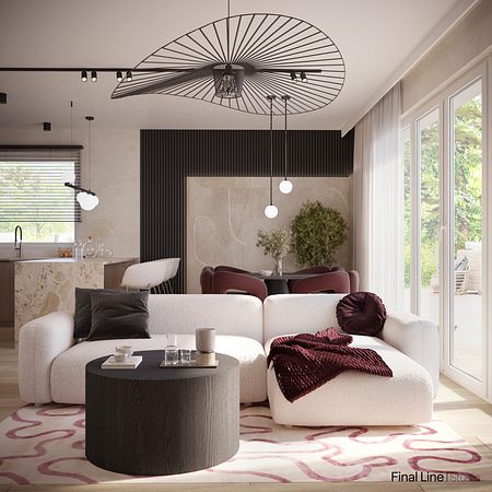 Nowoczesny salon z białą sofą, czarnym stolikiem i roślinami