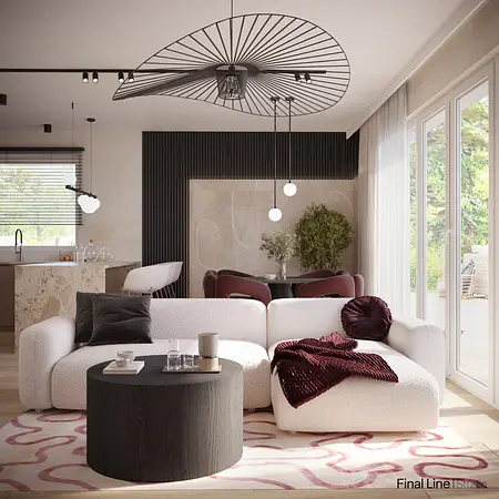 Nowoczesny salon z białą sofą, czarnym stolikiem i roślinami