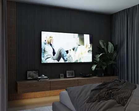 Wnętrze sypialni z telewizorem, drewnianą komodą, roślinami, styl quiet luxury.