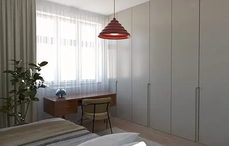 Wnętrze sypialni z eklektycznym biurkiem i vintage lampą.
