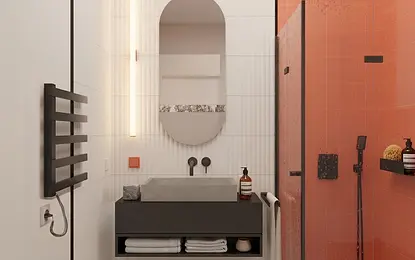 Wnętrze łazienki z industrialnym i minimalistycznym stylem, szarym blatem, pomarańczowymi płytkami.