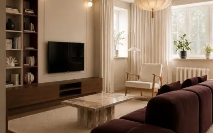 Wnętrze salonu w stylu art deco z brązową sofą i nowoczesnym oświetleniem.
