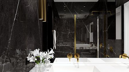 Nowoczesna łazienka w stylu glamour z czarnymi ścianami, białą wanną i złotymi akcentami.