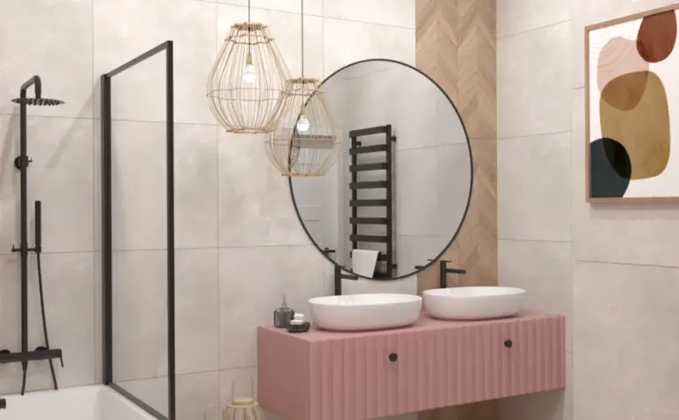 Wnętrze łazienki w stylu art deco i boho z różową umywalką.