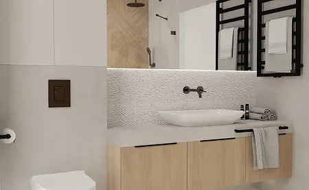 Wnętrze z nowoczesnym biurkiem, jasnym sofą i drewnianą podłogą.