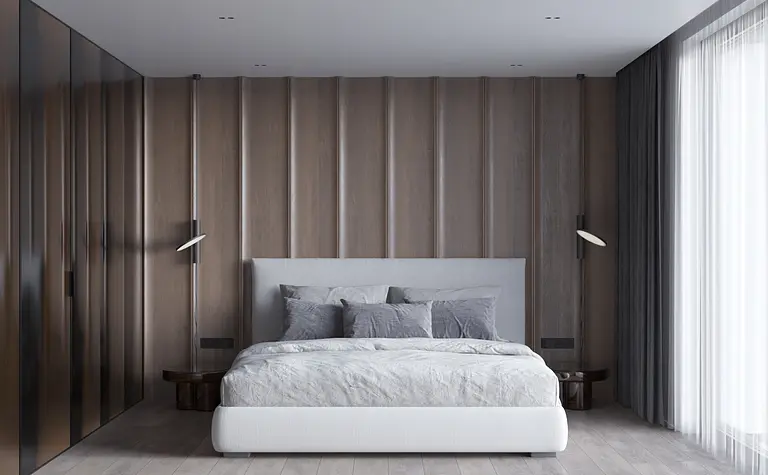 Sypialnia z minimalistycznym wystrojem, drewnianą ścianą i nowoczesnym łóżkiem.
