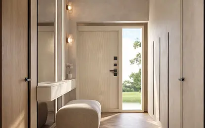 Przedpokój z nowoczesnym oświetleniem, drewnianymi meblami i jasnymi ścianami