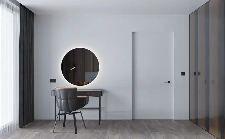 Minimalistyczne wnętrze z biurkiem i okrągłym lustrem