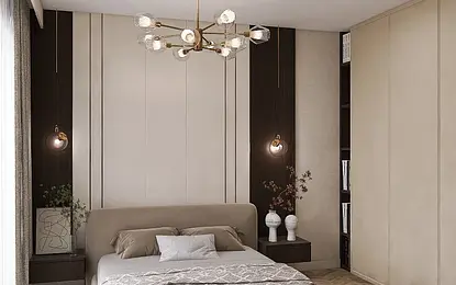Wnętrze sypialni z beżowym łóżkiem i nowoczesnymi lampami.
