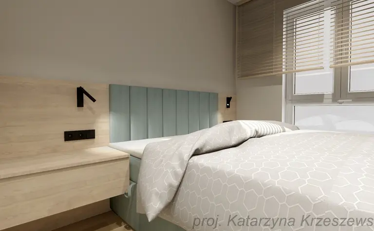 Sypialnia z niebieskim zagłówkiem, jasną pościelą i drewnianym meblem w stylu industrialnym, minimalistycznym.