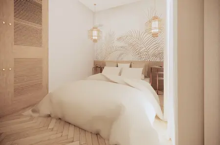 Sypialnia w stylu boho z beżowym łóżkiem i drewnianymi detalami.