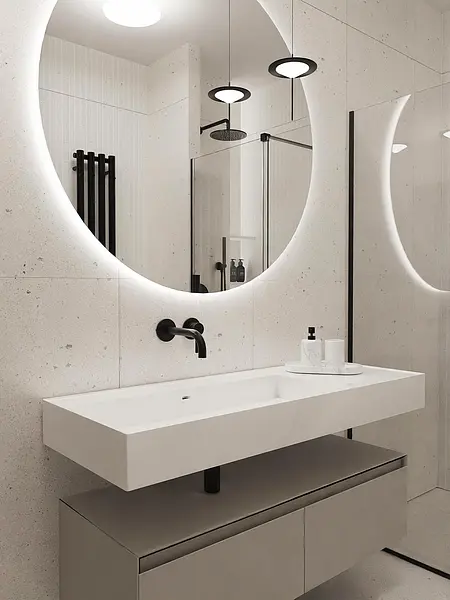 Nowoczesna łazienka w stylu japandi i minimalistycznym z dużym lustrem.