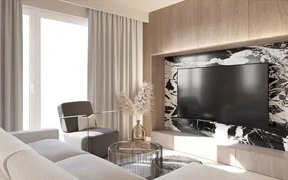 Wnętrze salonu w stylu japandi z minimalistycznymi meblami i nowoczesnym telewizorem.