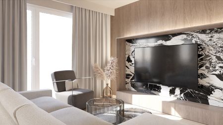 Wnętrze salonu w stylu japandi z minimalistycznymi meblami i nowoczesnym telewizorem.