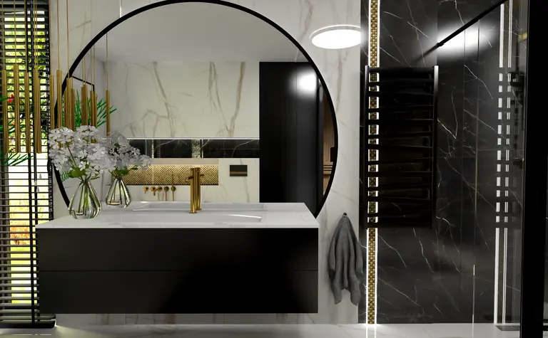 Wnętrze łazienki z czarną armaturą i złotymi detalami, styl glamour i nowoczesny.