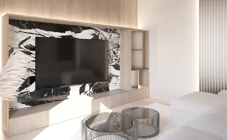 Wnętrze salonu w stylu japandi z minimalistycznym wystrojem i nowoczesnym telewizorem.