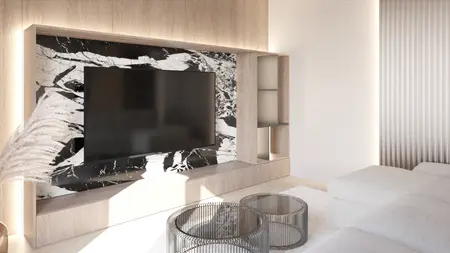 Wnętrze salonu w stylu japandi z minimalistycznym wystrojem i nowoczesnym telewizorem.
