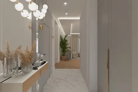 Przedpokój z białymi ścianami, drewnianą podłogą i rośliną w doniczce, styl dopamine decor