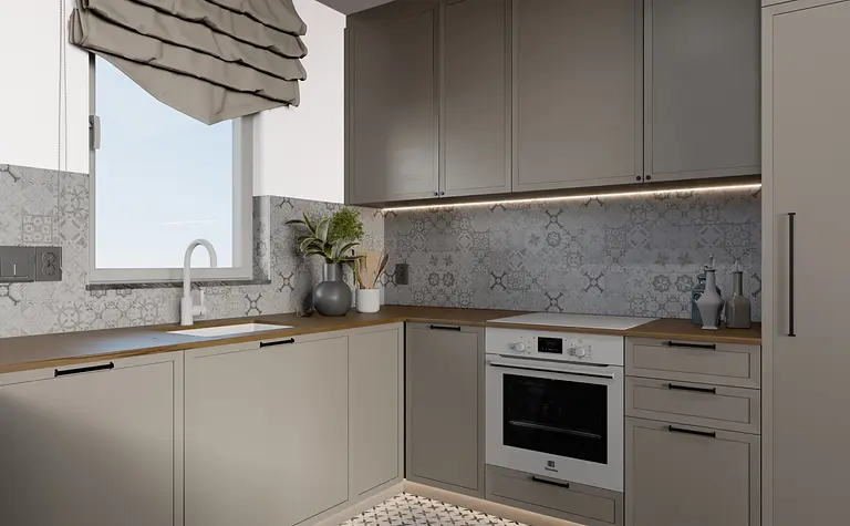 Kuchnia w stylu minimalistycznym z szarymi meblami i jasnym blatem