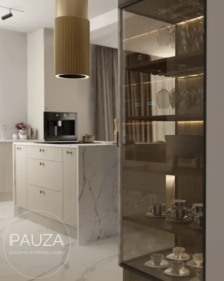 Kuchnia w stylu minimaluxe z wyspą, szklanym kredensem i nowoczesnym oświetleniem.