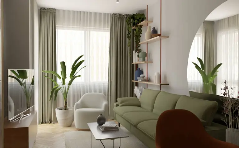 Wnętrze salonu w stylu soft minimalizm z zieloną sofą, roślinami i drewnianymi akcentami.