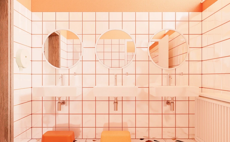 Wnętrze łazienki z białymi umywalkami i pomarańczowymi detalami w stylu dopamine decor i eklektycznym.