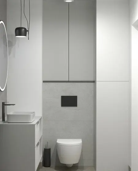 Nowoczesna łazienka z minimalistycznym designem, białymi meblami i szarymi akcentami.