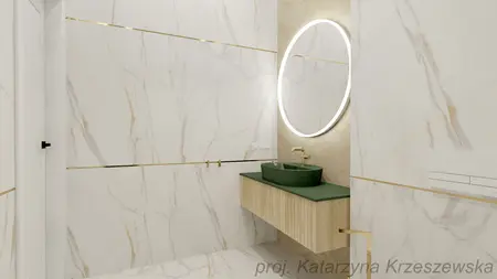 Wnętrze nowoczesnej łazienki z zieloną umywalką i marmurowymi akcentami.