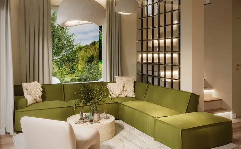 Wnętrze salonu w stylu boho i eklektycznym z zieloną sofą.