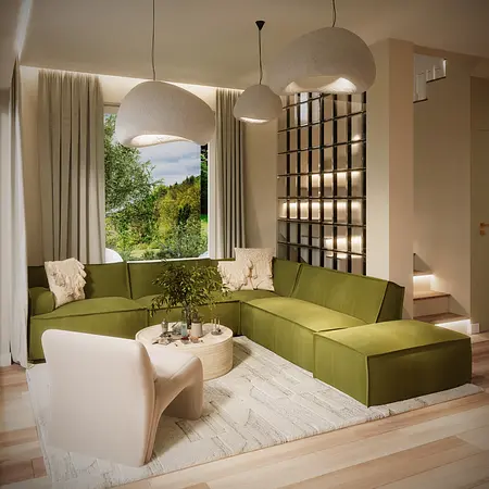 Wnętrze salonu w stylu boho i eklektycznym z zieloną sofą.