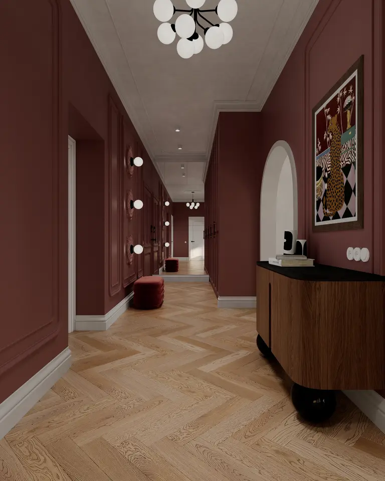 Przedpokój w stylu art deco z różowymi ścianami i drewnianą podłogą, minimalistyczne oświetlenie.