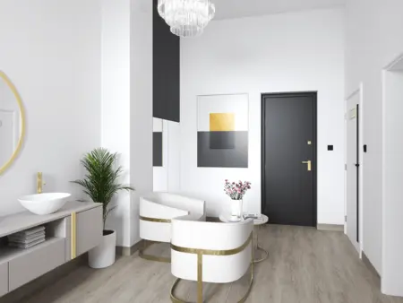 Przedpokój w stylu glamour z białymi meblami i nowoczesnymi detalami.