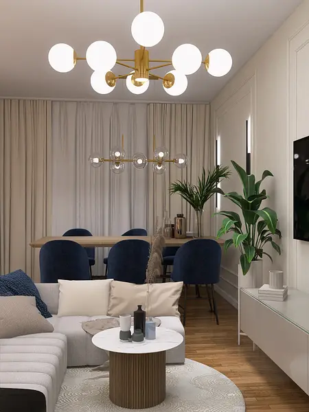 Nowoczesny salon z niebieskimi fotelami, jasnymi zasłonami i rośliną doniczkową.