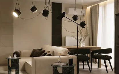 Salon w stylu eklektycznym z beżową sofą, zielonymi stolikami i nowoczesnym oświetleniem.