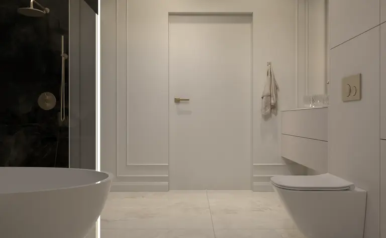 Nowoczesna łazienka z białą wanną, czarną kabiną prysznicową, eleganckimi detalami glamour.
