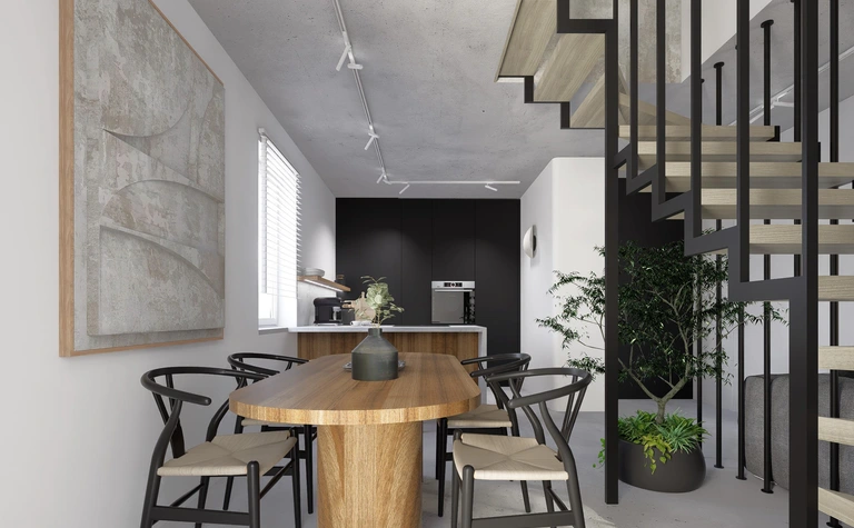Jadalnia w stylu industrialnym i minimalistycznym z drewnianym stołem i czarnymi detalami.