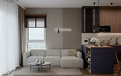 Wnętrze salonu w stylu japandi i współczesnym z szarym narożnikiem i drewnianymi akcentami.