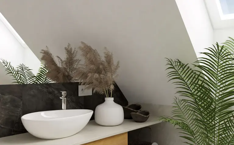 Nowoczesna łazienka boho z białą umywalką i roślinami