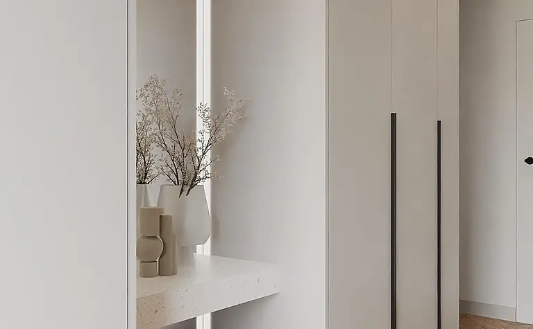 Nowoczesny przedpokój w stylu japandi z minimalistycznymi akcentami.