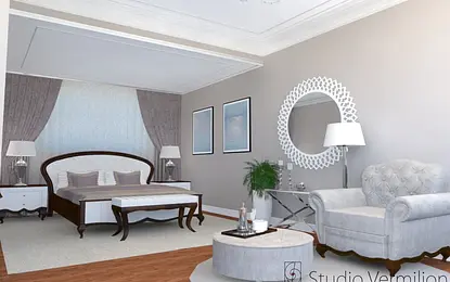 Sypialnia w stylu glamour i tradycyjnym z eleganckim łóżkiem i dekoracyjnym lustrem.