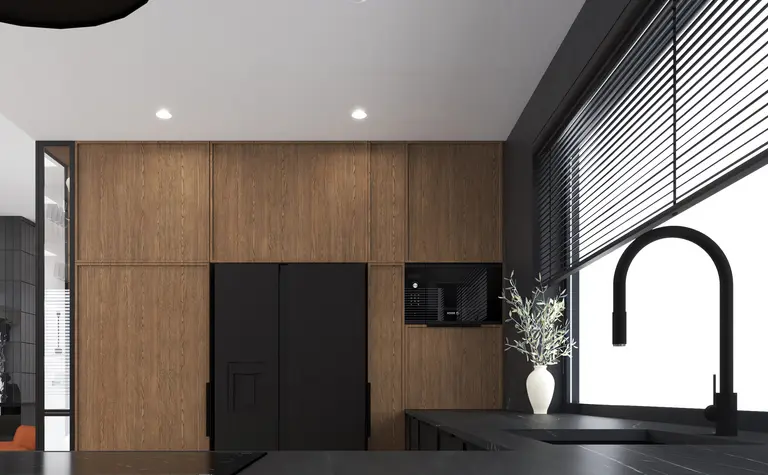Wnętrze kuchni w stylu industrialnym i minimalistycznym z drewnianymi elementami.