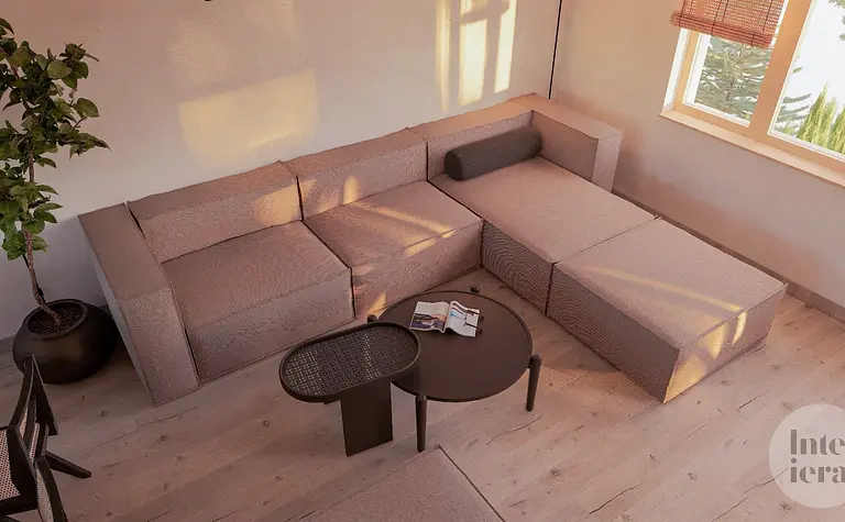 Wnętrze salonu w stylu japandi i minimalistycznym z jasną sofą, stolikiem i rośliną.
