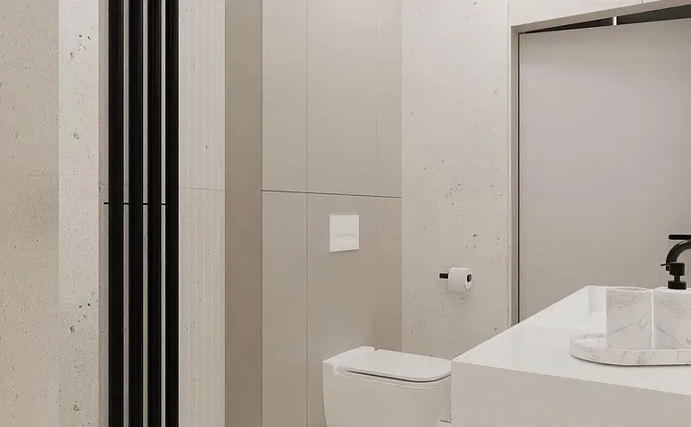 Wnętrze łazienki w stylu japandi, minimalistycznym i nowoczesnym z białymi elementami.